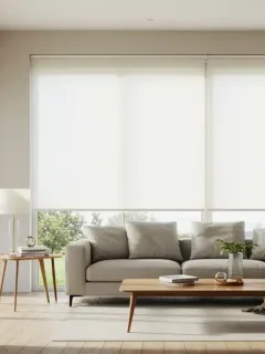 Modern living room with energy-efficient window treatments in a well-lit space