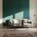 Modern living room showcasing wallpaper accent wall alongside painted walls in high-traffic area
